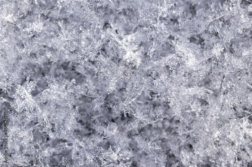 Solid background of transparent snowflakes