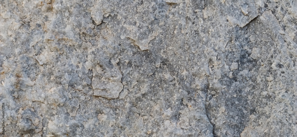 Natural gray stone as a background or texture seamless for design. High quality photo Natural gray stone as a background or texture seamless for design. High quality photo
