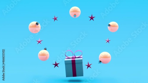 A gift box floating and spinning in the air, decorative stars and Christmas balls are on a blue background. New Year, Christmas concept. Copy space. 3d render.