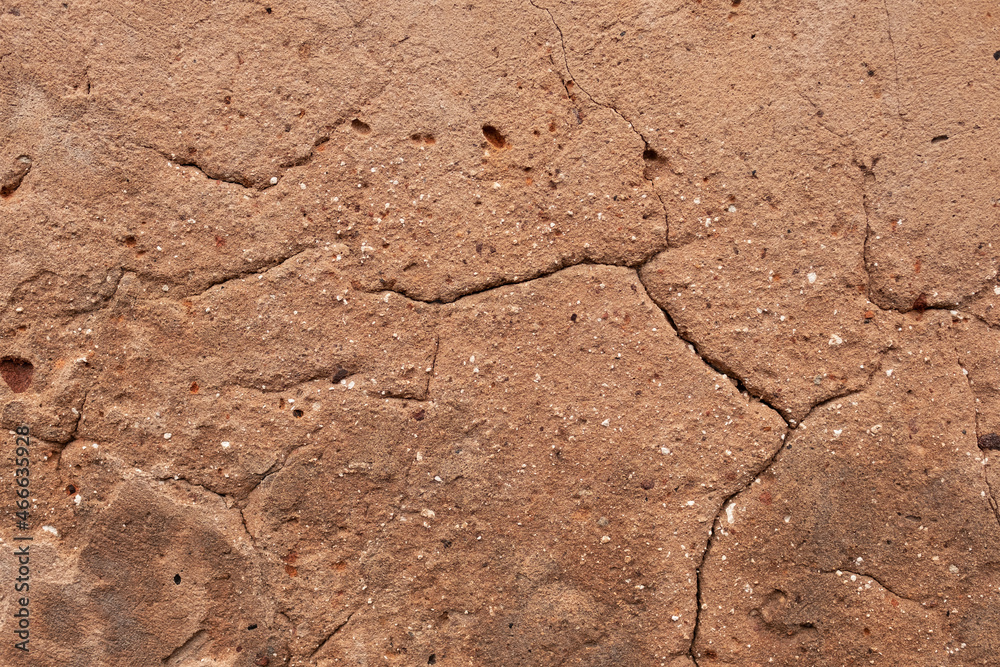 The texture of a rough clay wall. The texture of a rough clay wall.