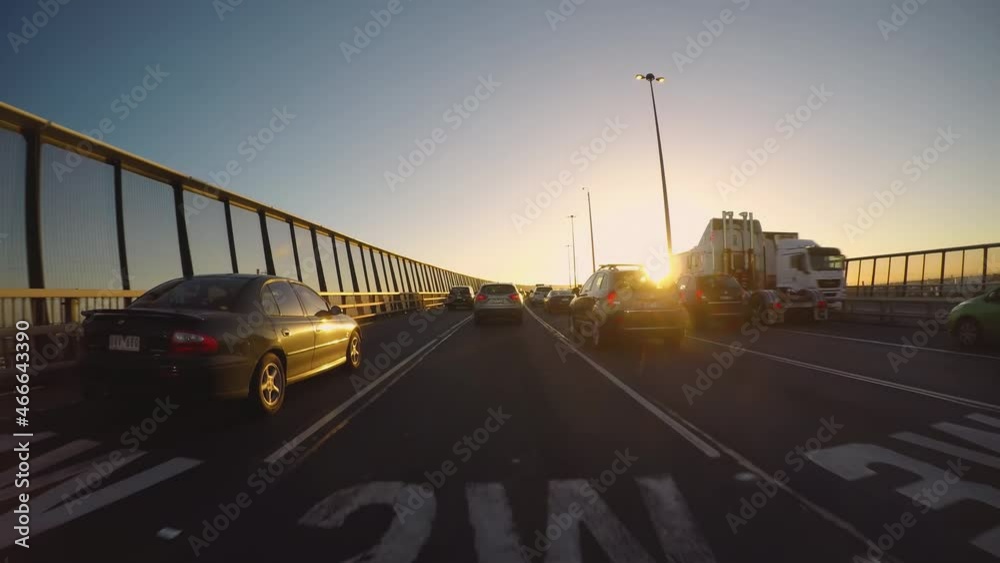 Time lapse drive on Melbourne city highway with bright sunrise, POV view Time lapse drive on Melbourne city highway with bright sunrise, POV view