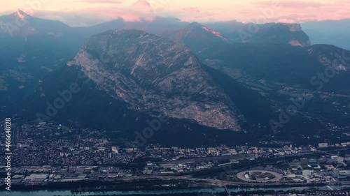 Grenoble aerial panoramic of city and alps french mountain view during epic cloudy sunset