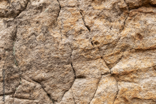 Natural stone with cracks for texture background.