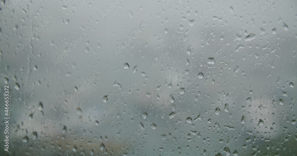 Raining on the window at bad weather