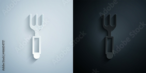 Paper cut Fork icon isolated on grey and black background. Cutlery symbol. Paper art style. Vector