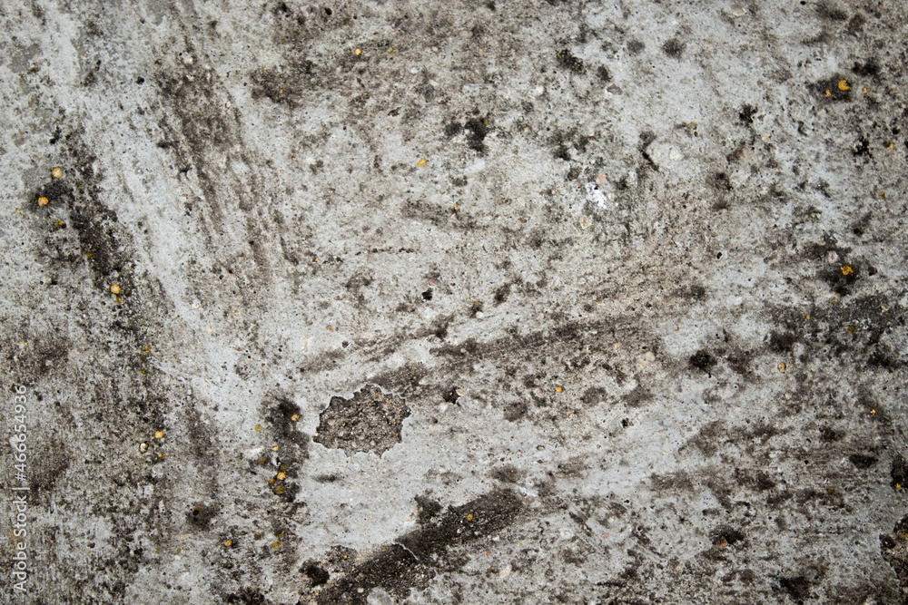 cracked stone wall background, view of old gray concrete cracked stone wall background, view of old gray concrete