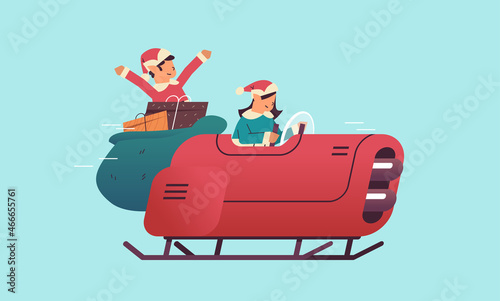 elves driving sleigh car with gifts merry christmas happy new year winter holidays celebration concept greeting card