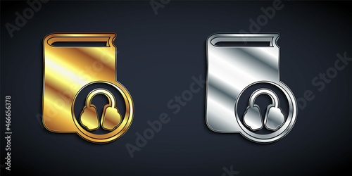 Gold and silver Audio book icon isolated on black background. Book with headphones. Audio guide sign. Online learning concept. Long shadow style. Vector