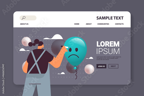 unhappy depressed woman drawing sad face on air balloon girl feeling desperate and lonely mental health diseases depression