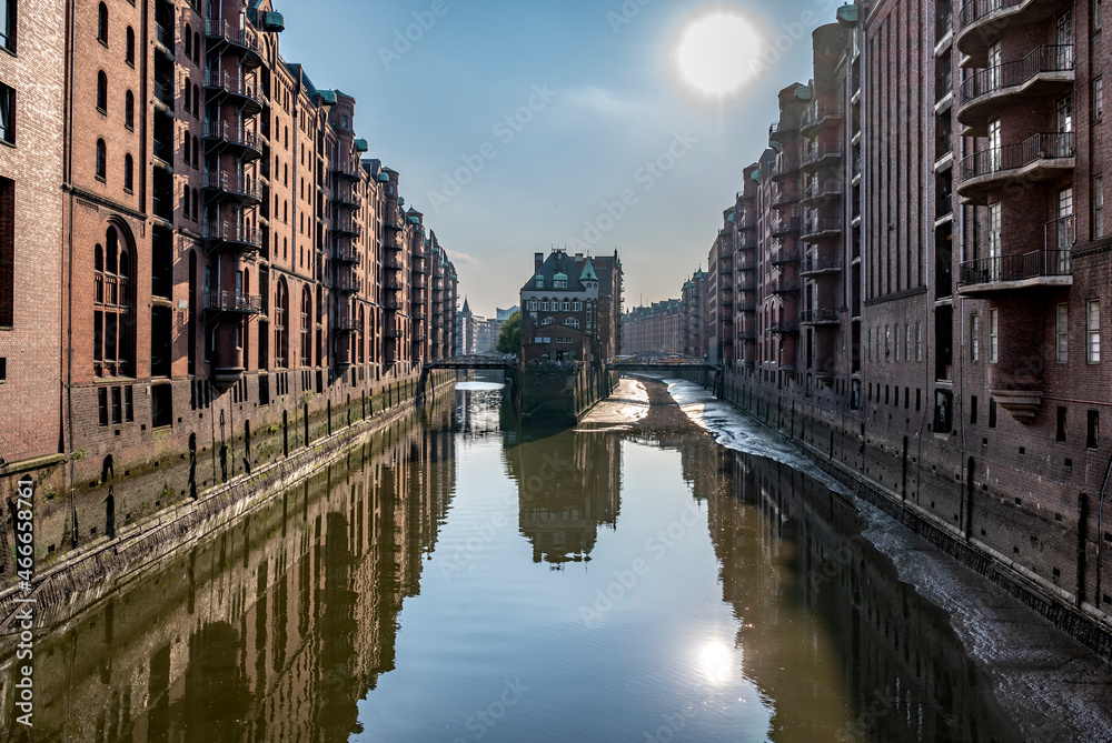 The famous Speicherstadt of Hamburg at ebb and daylight