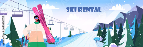 skier woman holding skis sportswoman skiing doing activities christmas new year holidays celebration winter vacation