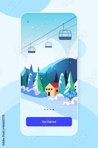 ski resort cableway in snowy mountains christmas new year holidays celebration winter vacation concept vertical