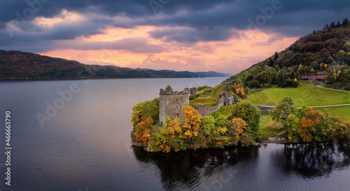 Stampa su tela Aerial view of the impressive Urquhart Castle at the Loch Ness during autumn sun