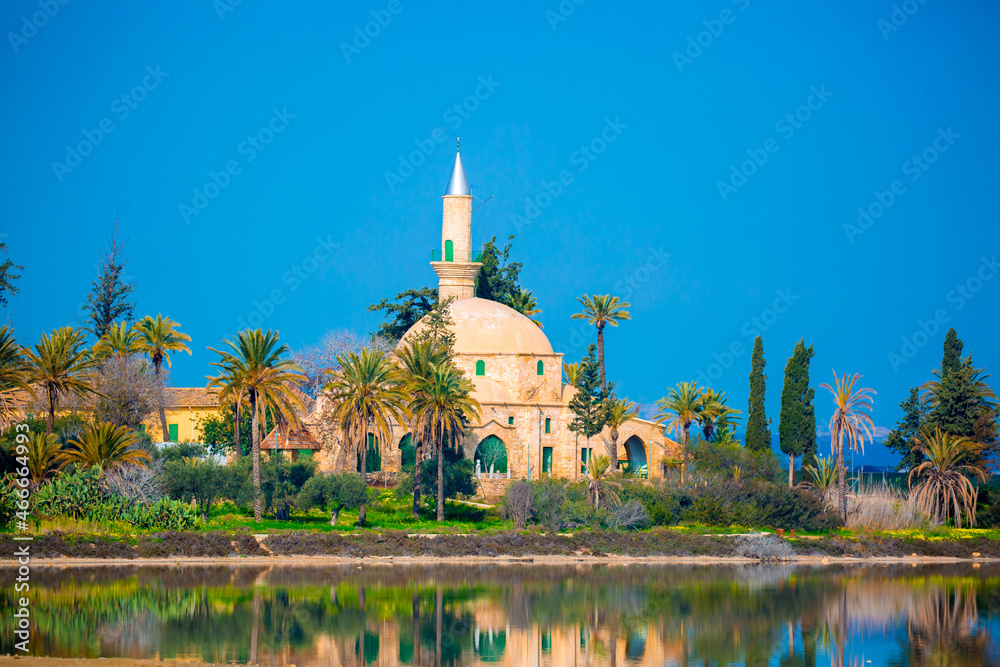 The ancient mosque Hala Sultan Tekkes on the shore of the salt lake in Cyprus in Larnaca, the Islamic religion is a Muslim shrine