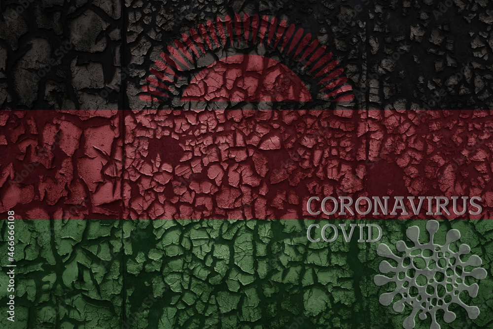 flag of malawi on a old metal rusty cracked wall with text coronavirus, covid, and virus picture.