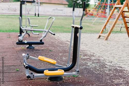 Exercise tools in the public park. Family and relax time on holiday concept.
