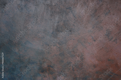 Texture materica dipinta a tempera di colore marrone e blu; spazio per testo