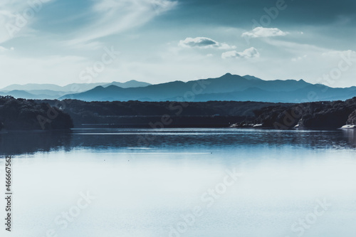 abstract view of lake and mountains in steel shades