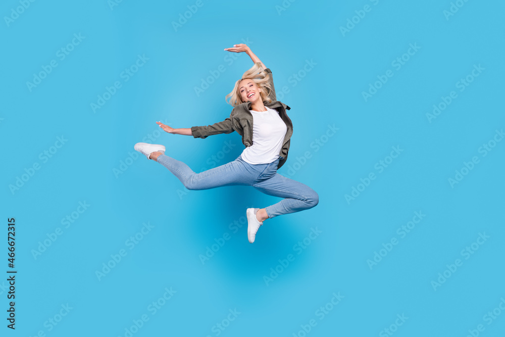 Fototapeta premium Full length body size photo woman jumping up dancing isolated pastel blue color background