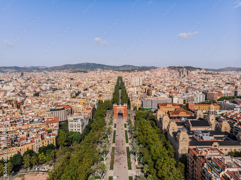 Drone view of the Arc de Triomphe in Barcelona. Ciutadella Park. Drone shot of a monument in Barcelona dividing the Pasech de Lewis Compans boulevard and the Pasech de Sant Joan boulevard