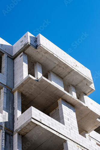 Construction of an apartment building. Monolithic concrete structure and foam block.