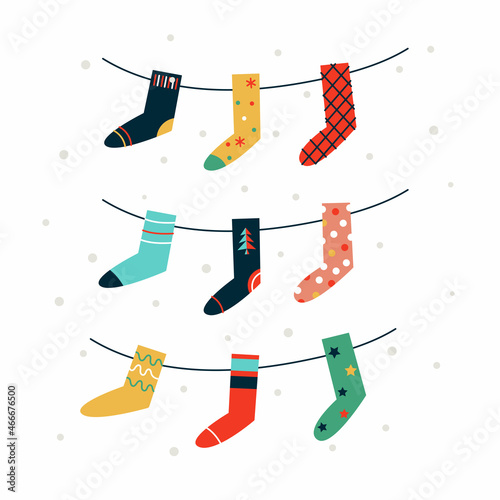 Vector illustration with colorful Christmas stockings isolated on white background.