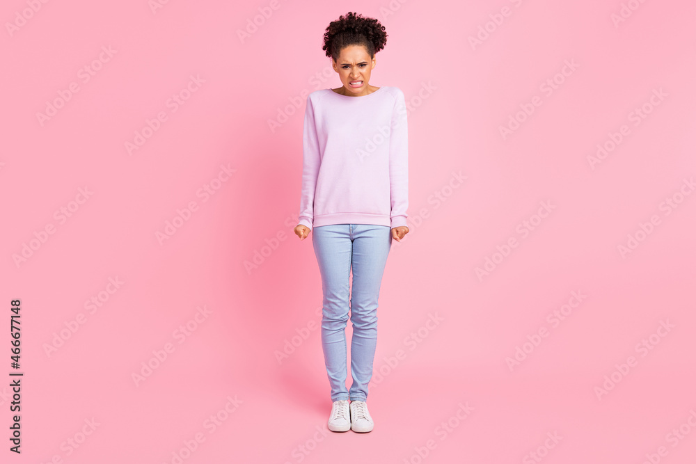 Full size photo of young angry furious mad afro american woman having problem conflict isolated on pink color background Full size photo of young angry furious mad afro american woman having problem conflict isolated on pink color background