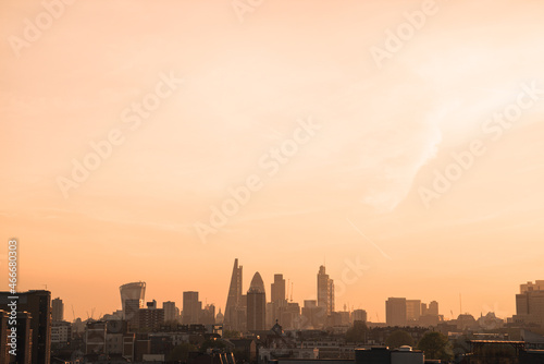 Cityscape and skyscrapers of London during sunset photo