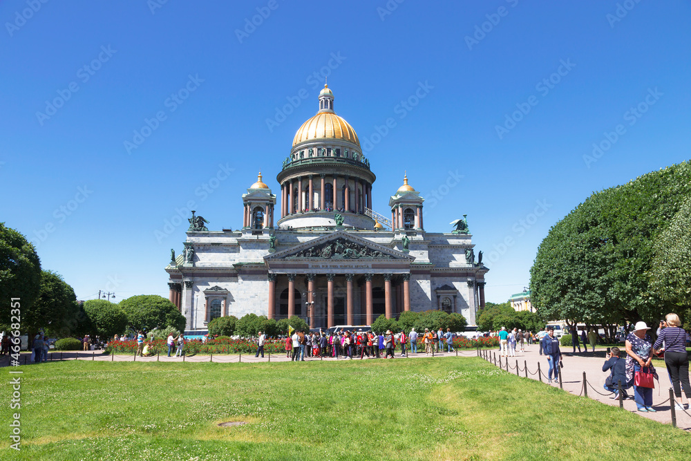 Tourists in the square near St. Isaac's Cathedral. Saint Petersburg, Russia