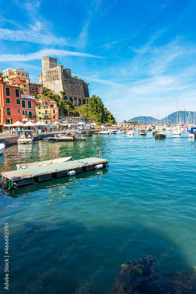 Ancient Castle of Lerici town (1152-1555) and the port with many boats moored. Tourist resort on the coast of the Gulf of La Spezia, Mediterranean sea (Ligurian Sea), Liguria, Italy, Europe.