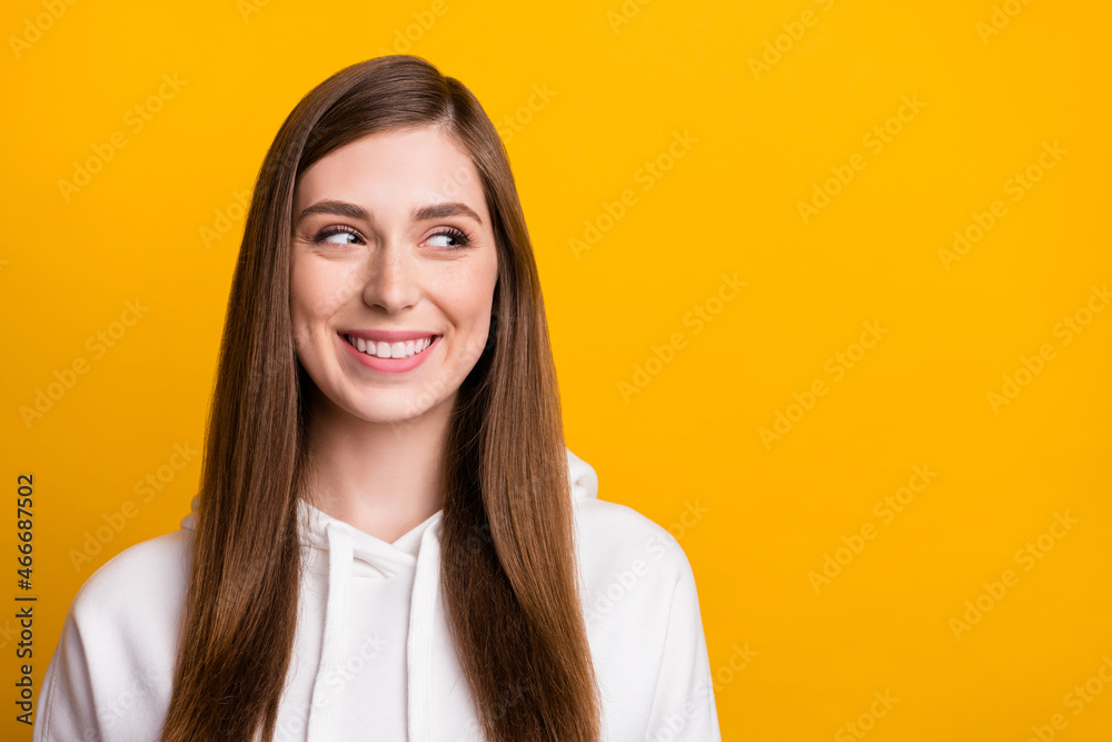 Photo of young dreamy happy positive woman look empty space good mood imagine isolated on yellow color background Photo of young dreamy happy positive woman look empty space good mood imagine isolated on yellow color background