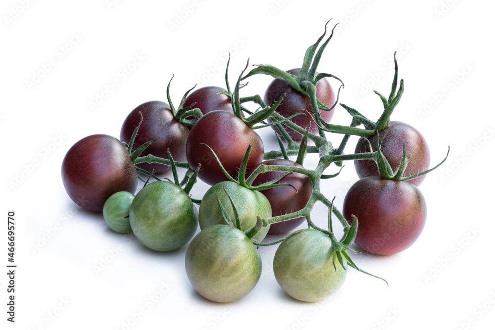 Fresh black cherry tomatoes isolated on white Fresh black cherry tomatoes isolated on white