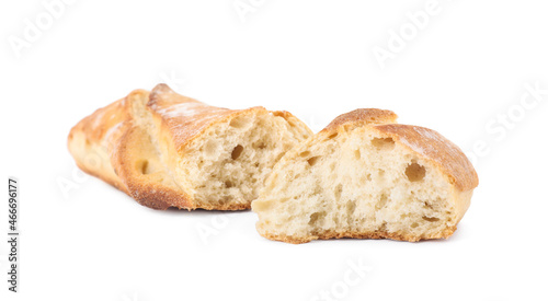 Pieces of fresh baguette on white background