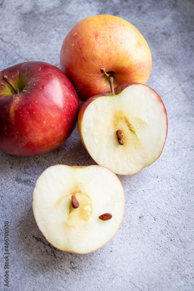 Red apples on a gray background. healthy eating Red apples on a gray background. healthy eating