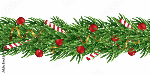 Seamles Christmas border of spruce branches isolated on white background. Christmas fir garland with lollipops, red balls, streamer. Vector illustration