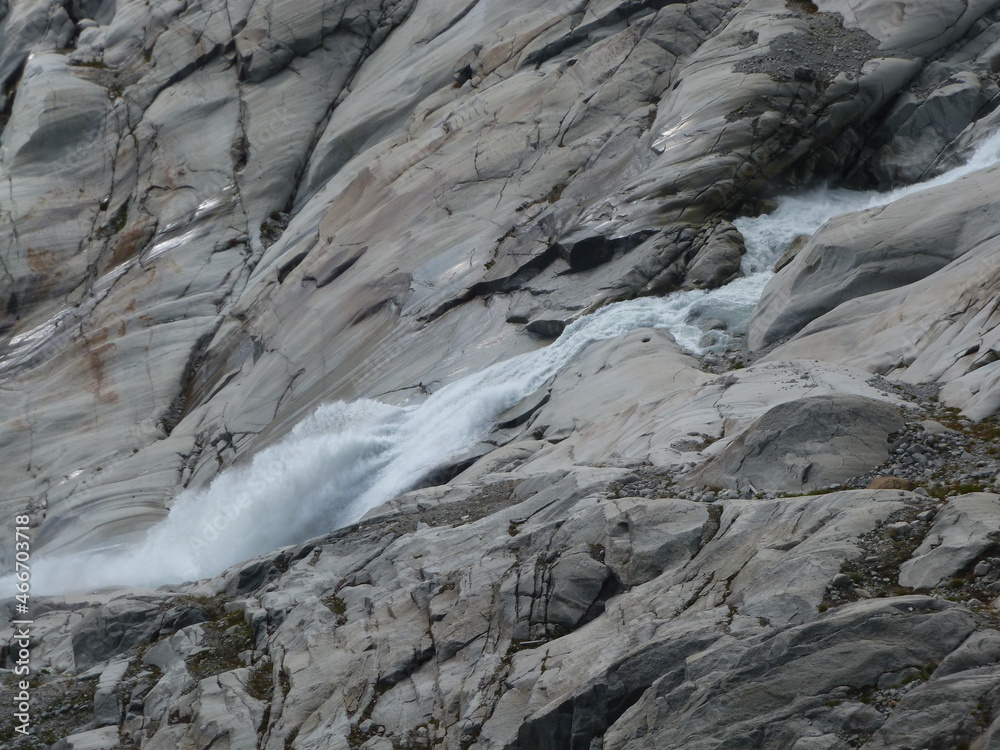Cascading waterfall at the spring of River Rhone, Gletsch, Obergoms, Wallis, Valais, Switzerland
