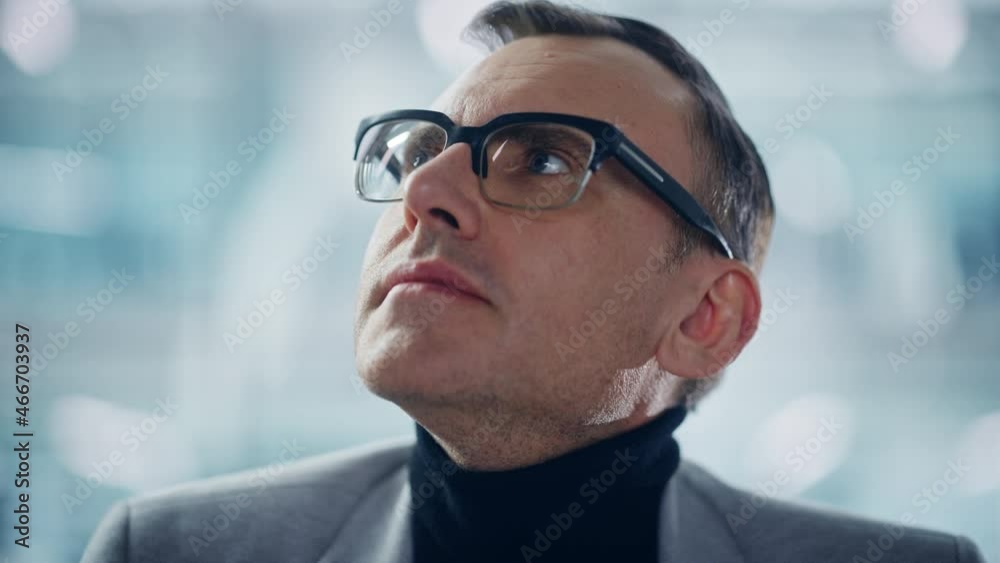 Portrait of Successful Middle Aged Caucasian Man Wearing Stylish Glasses Looking around in Wonder. Smart Executive. Digital Entrepreneur Thinking, Finding Solutions. Abstract Angle Creative Angle Portrait of Successful Middle Aged Caucasian Man Wearing Stylish Glasses Looking around in Wonder. Smart Executive. Digital Entrepreneur Thinking, Finding Solutions. Abstract Angle Creative Angle