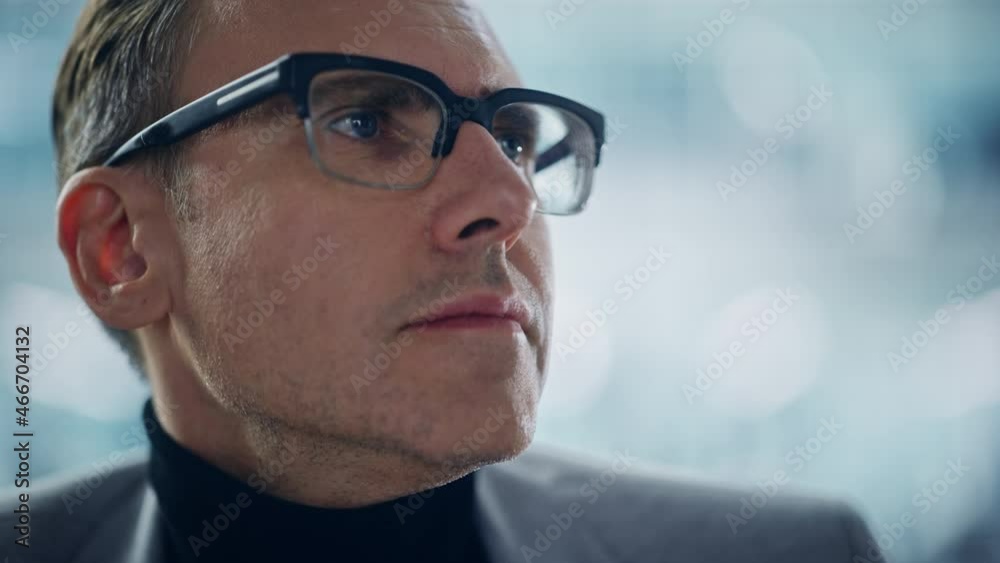 Portrait of Successful Middle Aged Caucasian Man Wearing Stylish Glasses Looking to the Side of Camera. Smart Executive. Digital Entrepreneur Thinking, Finding Solutions. Abstract Angle Creative Angle Portrait of Successful Middle Aged Caucasian Man Wearing Stylish Glasses Looking to the Side of Camera. Smart Executive. Digital Entrepreneur Thinking, Finding Solutions. Abstract Angle Creative Angle
