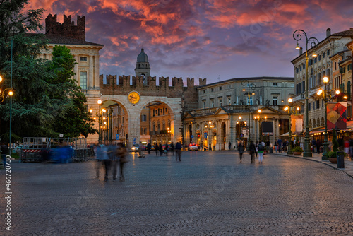 Medieval Gates to Piazza Bra in Verona at night, Italy. Architecture and landmark of Verona. Cozy cityscape of Verona.