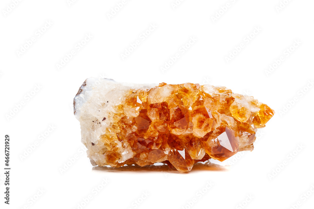 Macro mineral stone Citrine in rock in crystals on a white background Macro mineral stone Citrine in rock in crystals on a white background