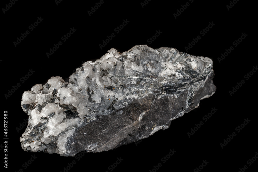 Macro mineral stone Stibnite quartz on a black background Macro mineral stone Stibnite quartz on a black background