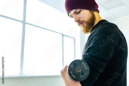 healthy lifestyle concept - man making exercises at home photo