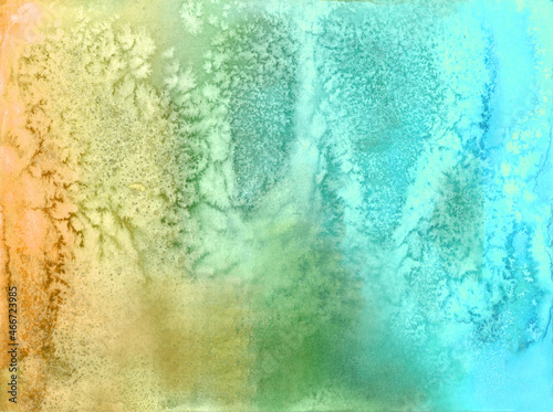 Abstract watercolor painting hand painted background tie dye and salt effect on grain torshon paper. Blue, yellow and green gradient, flowing ink. Turquoise stains 