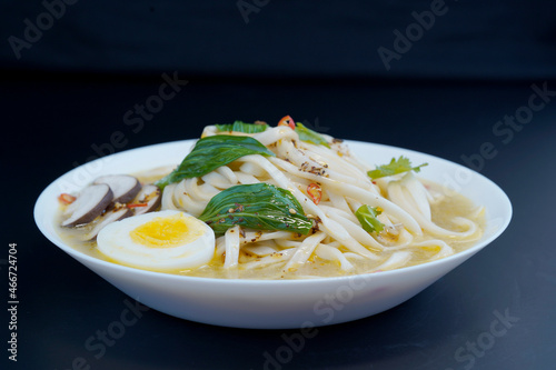 Delicious hand-pulled noodles with eggs, vegetables, shiitake mushrooms