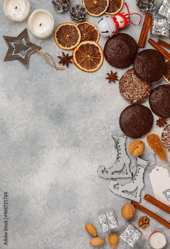Culinary Christmas background of Nuremberg gingerbread in chocolate and sugar glaze and other Christmas symbols