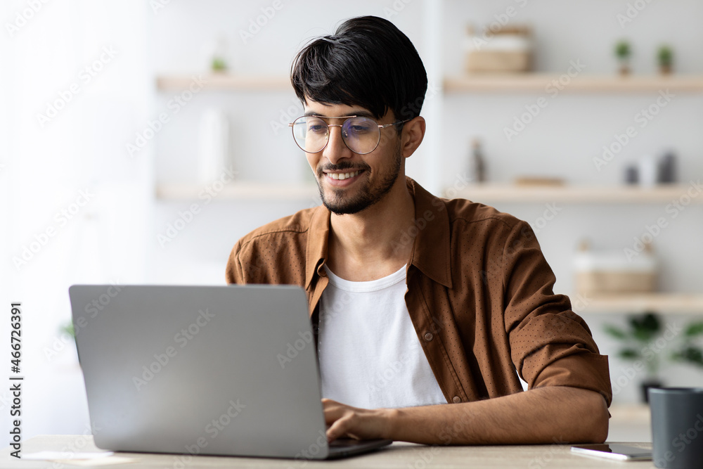Happy middle eastern man employee working at office Happy middle eastern man employee working at office