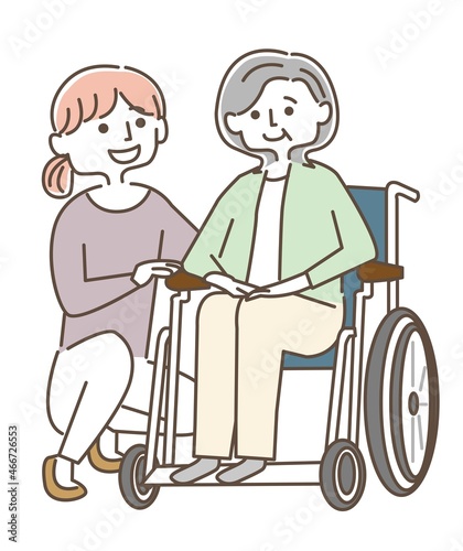 車椅子のおばあさんと介護をする女性