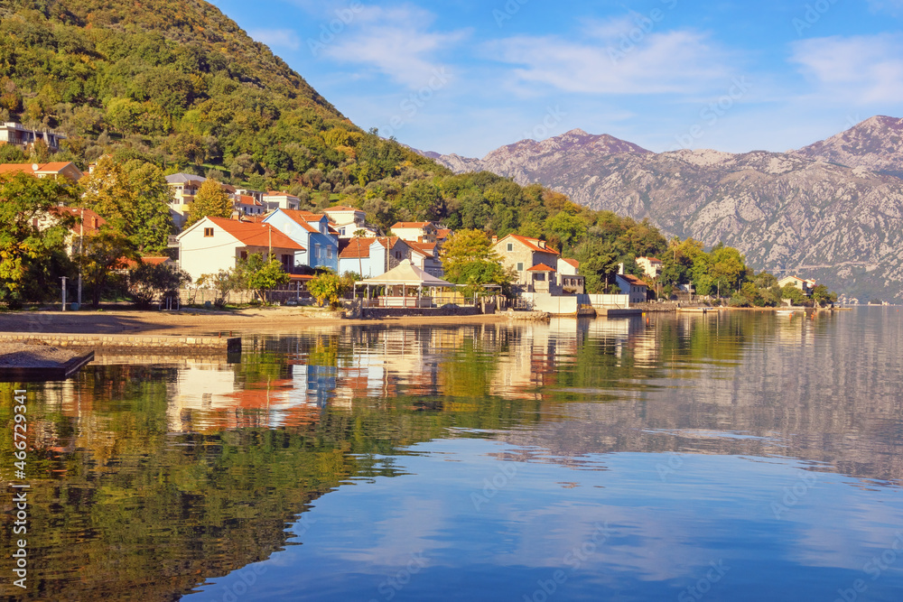 Fototapeta premium Beautiful Mediterranean landscape on sunny autumn day. Montenegro, Adriatic Sea. View of Bay of Kotor and Stoliv village