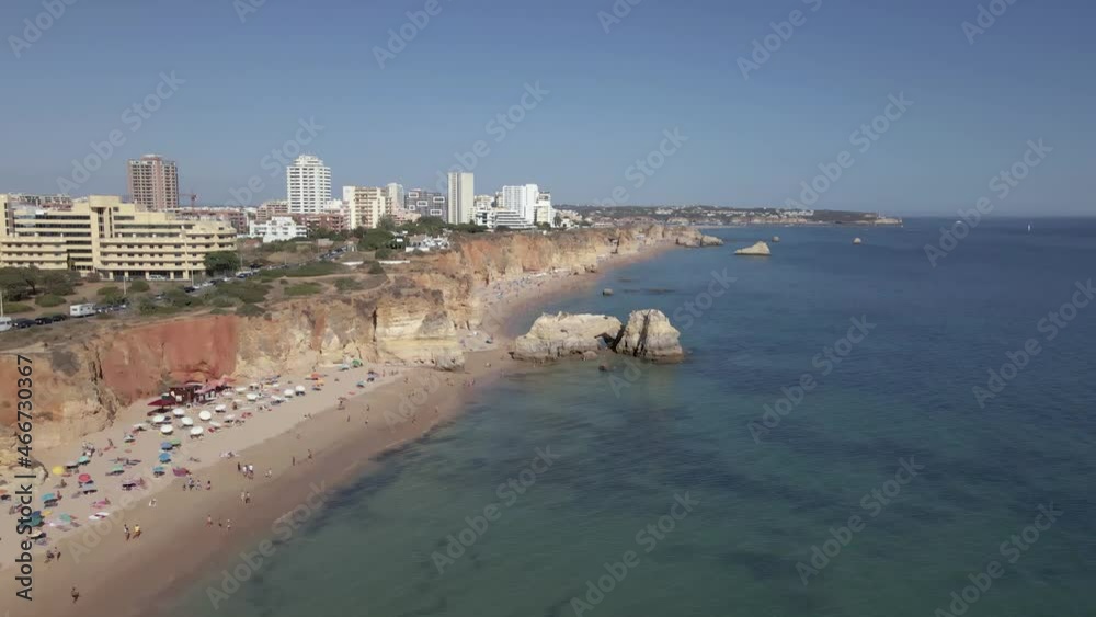 Aerial view of beach Praia dos Careanos, in Portimao, western Algarve tourism destination region, Portugal. Aerial view of beach Praia dos Careanos, in Portimao, western Algarve tourism destination region, Portugal.