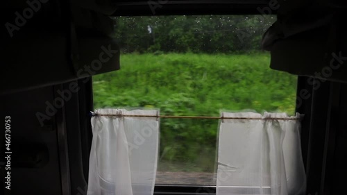 Wallpaper Mural View from the window of a train compartment during a vacation trip. Rainy weather outside the window on the train Torontodigital.ca